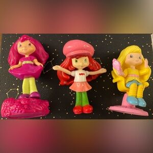 3 collector item strawberry shortcake dolls! C 2011 from McDonald’s happy meals!